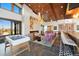 A lounge with a fireplace, foosball table, and bar offer community members room to entertain at 26909 E Cedar Ave, Aurora, CO 80018