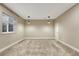 Basement with neutral carpet, recessed lighting, and a window, perfect for a home theater or game room at 2932 Eagle Wing Way, Castle Rock, CO 80109