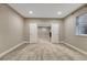 Spacious room with plush carpet, neutral walls, and a window, ideal for a home office or guest suite at 2932 Eagle Wing Way, Castle Rock, CO 80109