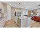 Spacious kitchen island with granite countertops, stainless steel appliances, and open layout at 2932 Eagle Wing Way, Castle Rock, CO 80109
