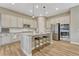 Kitchen featuring stainless steel appliances, granite countertops, and an island with bar seating at 2932 Eagle Wing Way, Castle Rock, CO 80109