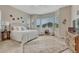 Serene main bedroom with a large window and neutral decor at 2932 Eagle Wing Way, Castle Rock, CO 80109
