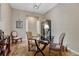 Inviting office with neutral walls, wood floors, glass desk and seating for three at 2932 Eagle Wing Way, Castle Rock, CO 80109
