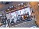 Aerial view of rooftops, some covered in snow, highlighting patios and rooftop amenities at 1235 31St St, Denver, CO 80205