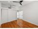 Bright bedroom featuring hardwood floors, closet space, and a fresh, minimalist design at 1235 31St St, Denver, CO 80205