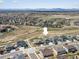 An aerial view of a two-story home in a residential neighborhood at 8346 E 132Nd Dr, Thornton, CO 80602