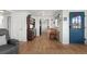 Inviting living room featuring hardwood floors, modern decor, and an abundance of natural light at 3300 Oneida St, Denver, CO 80207