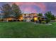 A spacious backyard with a gazebo, patio, and lush greenery, perfect for outdoor entertainment and relaxation at 7 Sandpiper Cir, Thornton, CO 80241