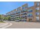 Apartment building with balconies and large windows in a modern, urban setting at 7240 W Custer Ave # 417, Lakewood, CO 80226