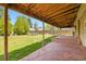 Inviting covered back patio with decorative concrete, offering a relaxing outdoor space at 5419 E 113Th Ave, Thornton, CO 80233