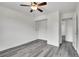 This spacious bedroom features sleek gray floors at 5419 E 113Th Ave, Thornton, CO 80233