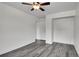The bedroom is bright and spacious with luxury gray flooring at 5419 E 113Th Ave, Thornton, CO 80233