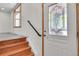 Entryway with decorative glass door and staircase at 5419 E 113Th Ave, Thornton, CO 80233