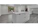 Bright, open living space featuring a large window and modern finishes at 5419 E 113Th Ave, Thornton, CO 80233