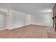 Inviting living space featuring modern flooring, a brick fireplace, and bright natural lighting at 5419 E 113Th Ave, Thornton, CO 80233