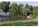 Spacious backyard with a well-maintained lawn and wooden fence at 7154 S Hudson Cir, Centennial, CO 80122