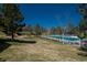 Community pool and playground with surrounding green space at 7154 S Hudson Cir, Centennial, CO 80122