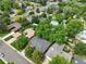 Aerial view of property with mature trees and surrounding neighborhood at 2957 S York St, Denver, CO 80210