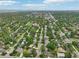 Picturesque aerial view of a residential neighborhood with lush greenery and distant cityscape at 2957 S York St, Denver, CO 80210