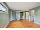 Bedroom boasting hardwood floors, recessed lighting, and two open closets at 2957 S York St, Denver, CO 80210