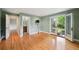 Bedroom featuring hardwood floors, recessed lights, ensuite bath and French door to the backyard at 2957 S York St, Denver, CO 80210