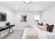 Bright bedroom with modern furnishings and decor and a comfortable space for relaxing at 2040 W 45Th Ave, Denver, CO 80211
