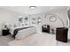 Bright bedroom with stylish furniture, plush carpet, and large windows offering plenty of natural light at 2040 W 45Th Ave, Denver, CO 80211