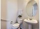 Clean and updated half bathroom with pedestal sink at 9633 Brentwood Way # B, Broomfield, CO 80021