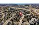 Aerial view of a neighborhood showcasing the home's location at 580 Crossing Cir, Castle Pines, CO 80108