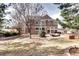 Expansive backyard featuring a patio area perfect for outdoor entertaining and relaxation at 580 Crossing Cir, Castle Pines, CO 80108