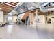 Unfinished basement featuring exposed ceiling and duct work and an open layout at 580 Crossing Cir, Castle Pines, CO 80108