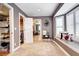 Spacious bedroom with a walk-in closet, bay window, and ensuite bathroom at 580 Crossing Cir, Castle Pines, CO 80108