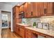 The kitchen shows the countertop decor and wood cabinets at 580 Crossing Cir, Castle Pines, CO 80108