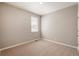 Bedroom featuring neutral paint, carpet flooring and a window at 18336 Prince Hill Cir, Parker, CO 80134