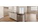 Open concept kitchen and dining space featuring stainless steel appliances and sliding glass door at 18336 Prince Hill Cir, Parker, CO 80134
