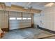 An empty two car garage featuring a concrete floor and drywall ready to be finished at 5686 Eagle River Pl, Brighton, CO 80601