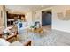 Comfortable living room featuring contemporary decor, neutral tones, and an open layout, filled with natural light at 5686 Eagle River Pl, Brighton, CO 80601