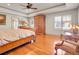 Spacious main bedroom suite with hardwood floors, tray ceiling and natural light at 106 S University Blvd # 2, Denver, CO 80209