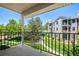 Enjoy picturesque views from this balcony overlooking landscaped grounds and neighboring buildings in a serene setting at 6755 S Field St # 625, Littleton, CO 80128