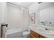 A well-lit bathroom with modern fixtures, a shower, and a white bathtub, perfect for relaxation at 6755 S Field St # 625, Littleton, CO 80128