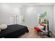 Bright bedroom featuring lots of natural light and a comfortable seating area by the windows at 6755 S Field St # 625, Littleton, CO 80128