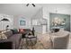 Inviting living room featuring modern furniture, an open layout and bright, neutral decor at 6755 S Field St # 625, Littleton, CO 80128