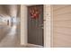 Private condo entrance with a decorative wreath at 7292 S Blackhawk St # 2-103, Englewood, CO 80112