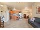 Kitchen with island, stainless steel appliances, and wood cabinets at 7292 S Blackhawk St # 2-103, Englewood, CO 80112