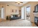 Living room features a fireplace and sliding door to patio at 7292 S Blackhawk St # 2-103, Englewood, CO 80112