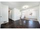 Spacious living room with dark hardwood floors offering lots of natural light at 10555 Montview Blvd, Aurora, CO 80010