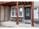 Inviting entryway with brick pillars, seating area, and well-maintained exterior at 1128 S Ventura Cir # K, Aurora, CO 80017