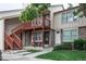 Charming condo with brick facade, private balcony, and inviting entryway at 1128 S Ventura Cir # K, Aurora, CO 80017