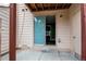 Cozy outdoor patio with sliding glass door leading inside at 1128 S Ventura Cir # K, Aurora, CO 80017