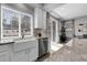 Bright kitchen features stainless appliances, undermount sink, granite countertops, and a view to the backyard at 2354 Cactus Bloom Ct, Castle Rock, CO 80109